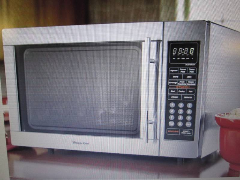 lot 32 image: 1.3 Cu. Ft. Stainless Steel Microwa...