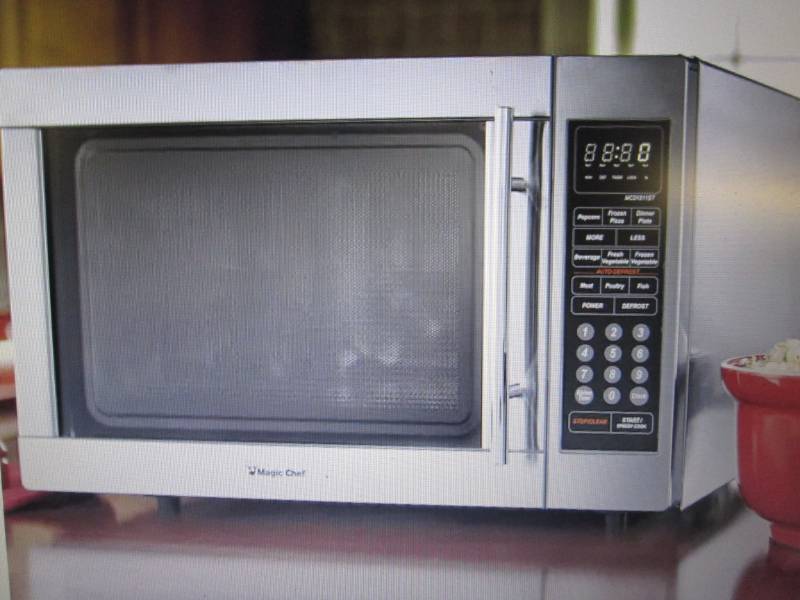 lot 34 image: 1.3 Cu. Ft. Stainless Steel Microwa...