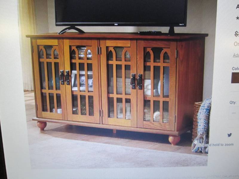 lot 35 image: Arched-Door Mission Style 4-Door TV...