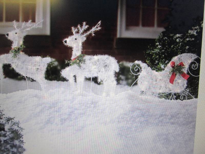 lot 99 image: Twinkle Reindeer Set open box Retai...