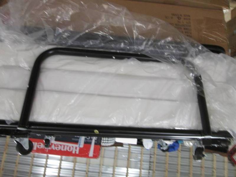 lot 124 image: Sleeper Ottoman open box, no cover ...
