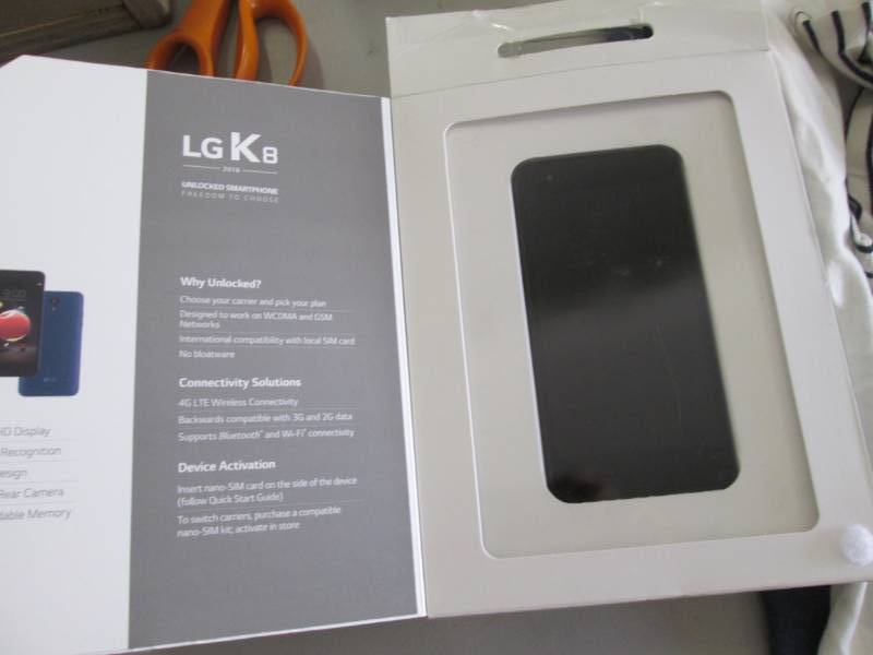 lot 134 image: Unlocked LG SmartPhone- untested, 2...