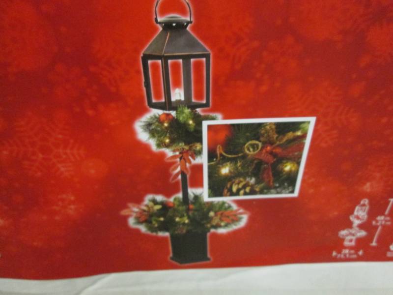 lot 207 image: 4 ft Lantern Potted LED Pre-Lit Tre...