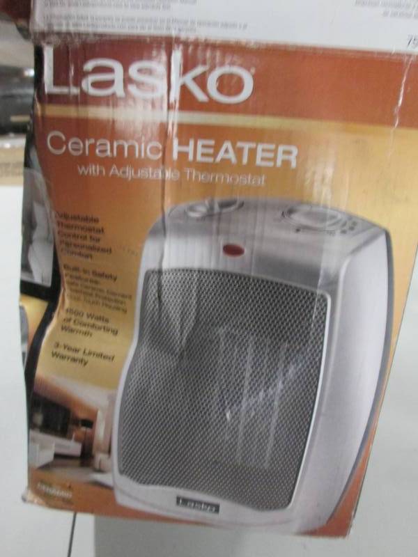 lot 214 image: Lasko Ceramic Heater open box, test...