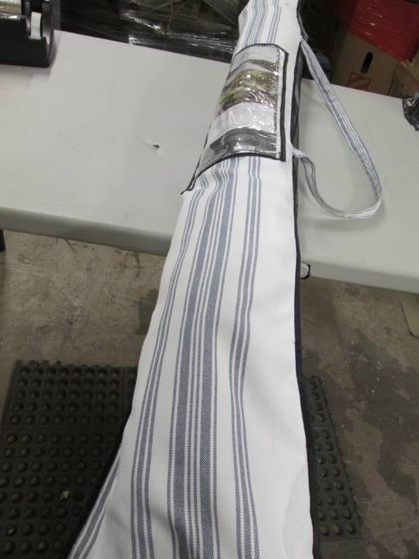 lot 255 image: Threshold 9 ft Patio Umbrella Retai...