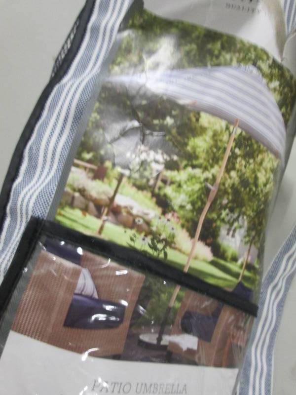 lot 257 image: Threshold 9 ft Patio Umbrella Retai...