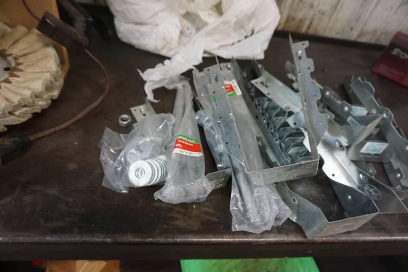 lot 74 image: Lot of Metal Joist Hangers and Lag Bolts In Assorted Sizes