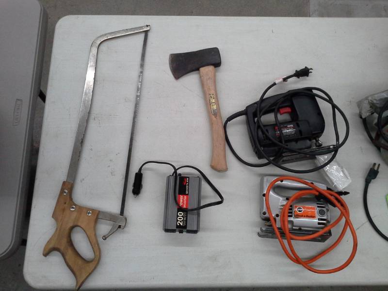 lot 494 image: Hacksaw, Hatchet, Jigsaw, Skilsaw Circular Saw, Battery Charger, Assorted Merchants Hooks, Field Jacket