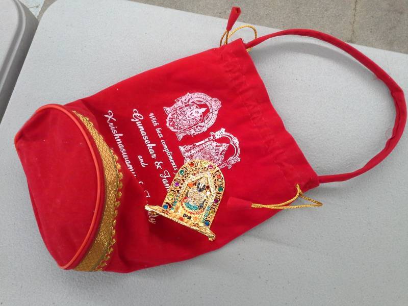 lot 491 image: Gold and Jewels Religious Table Dcor with Felt Carry Sack