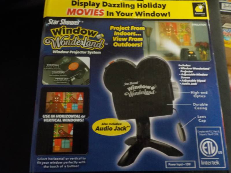 lot 22 image: Star Shower Window Projector System...