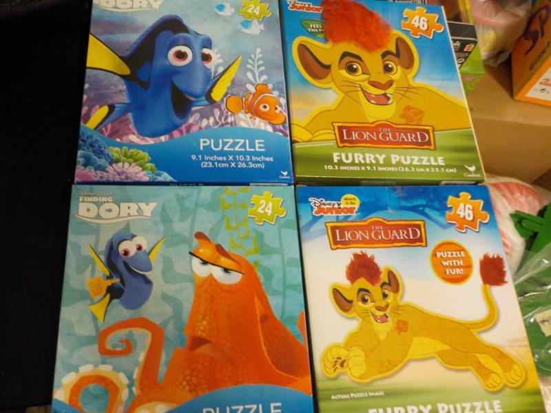 lot 23 image: 4 New Puzzles...