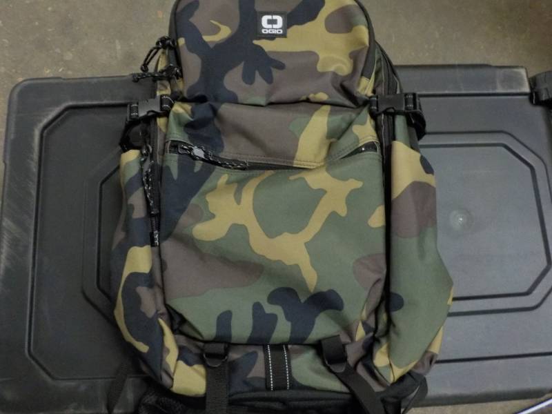 lot 120 image: Ogio Camoflage Backpack...