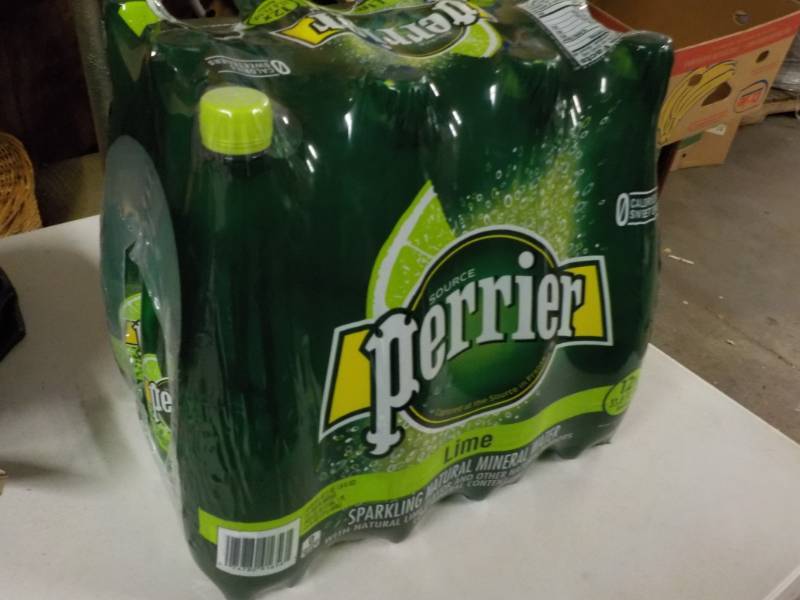 lot 237 image: Case of 12 Perrier Lime Sparkling N...