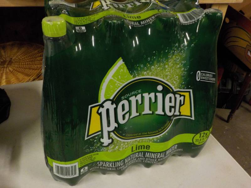 lot 243 image: Case of 12 Perrier Lime Sparkling N...