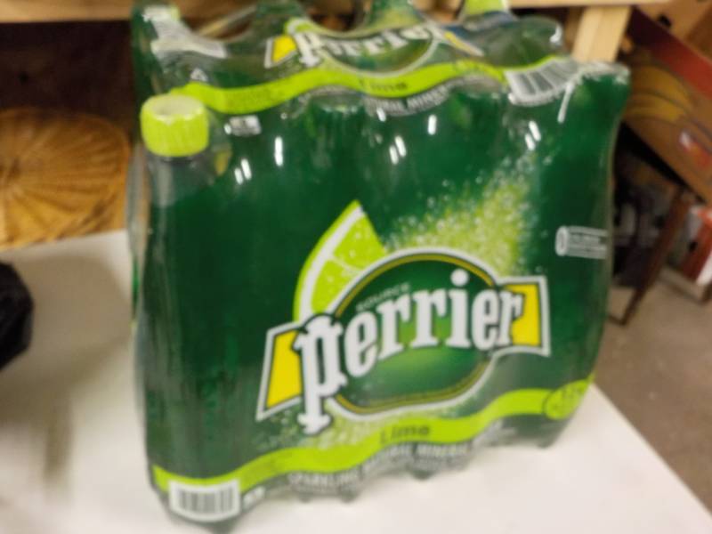 lot 244 image: Case of 12 Perrier Lime Sparkling N...