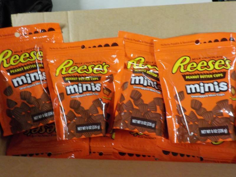 lot 249 image: 4 - 8 oz bags of Reeses Minis...