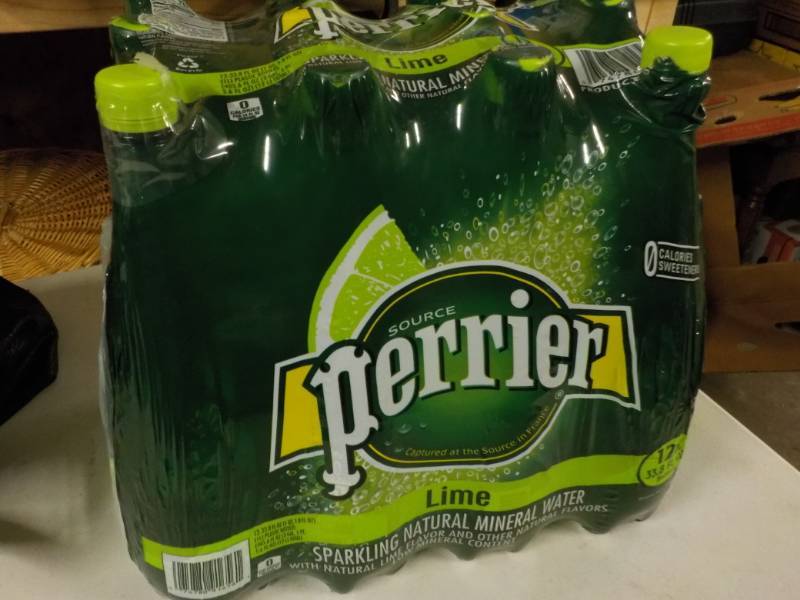 lot 250 image: Case of 12 Perrier Lime Sparkling N...