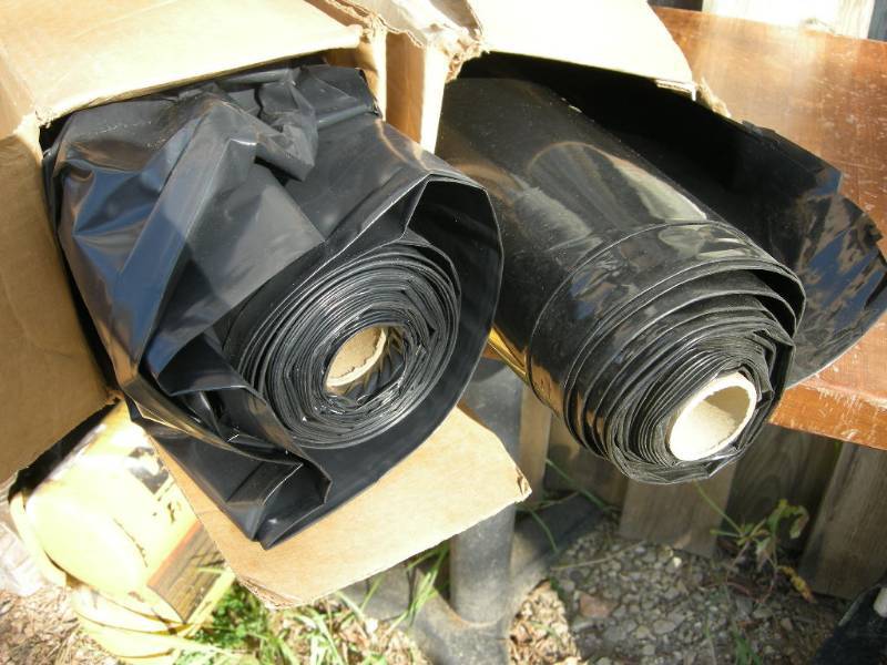 lot 118 image: 2 Partial Rolls of Black Plastic