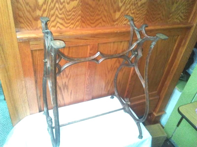 lot 115 image: Vintage treadle sewing machine.