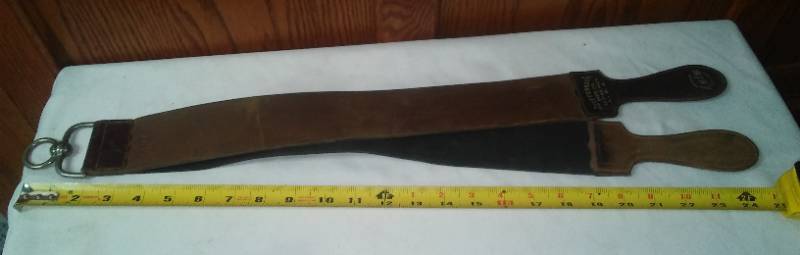 lot 187 image: Vintage horsehide strop straight edge sharpening leathers