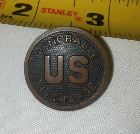 lot 234 image: WWI honorable discharge pin. Rare.