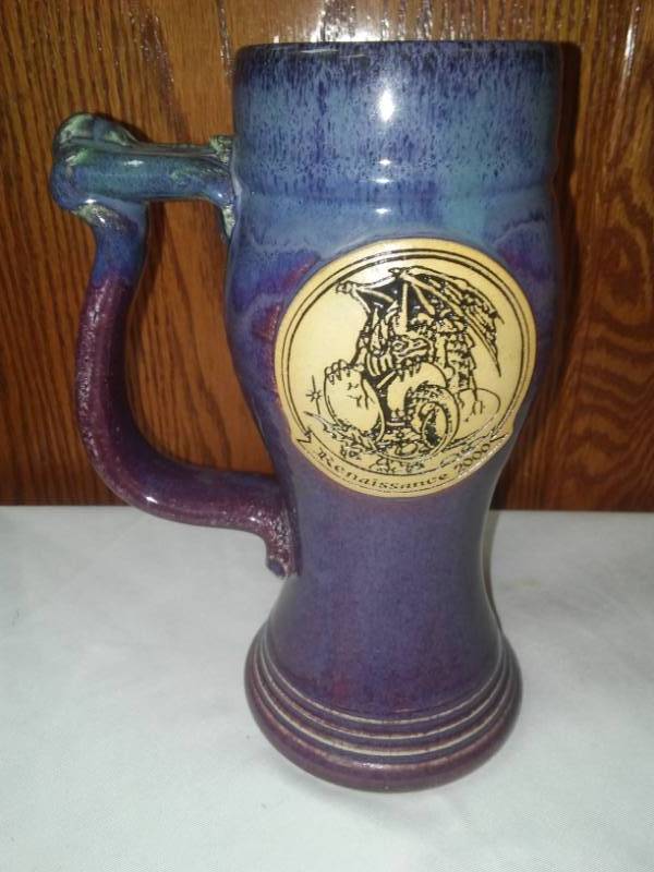 lot 274 image: Mm Renaissance Festival mug.
