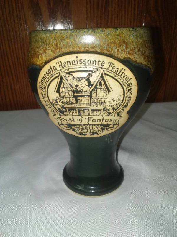 lot 275 image: 2011 Renaissance Festival mug.