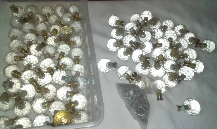 lot 306 image: About 75 glass knob cabinet