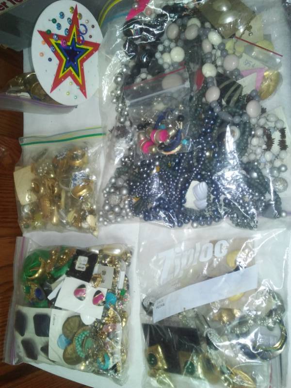 lot 313 image: Jewelry - new and used earrings, bracelets and more.