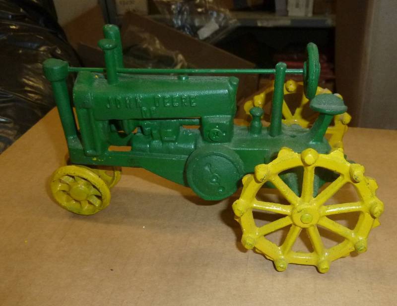 lot 5 image: Cast iron John Deere GP tractor...