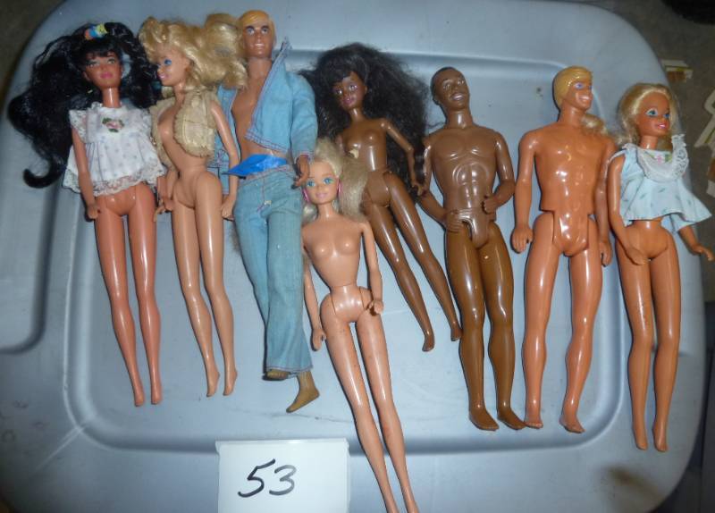 lot 53 image: 14 barbie and ken dolls...