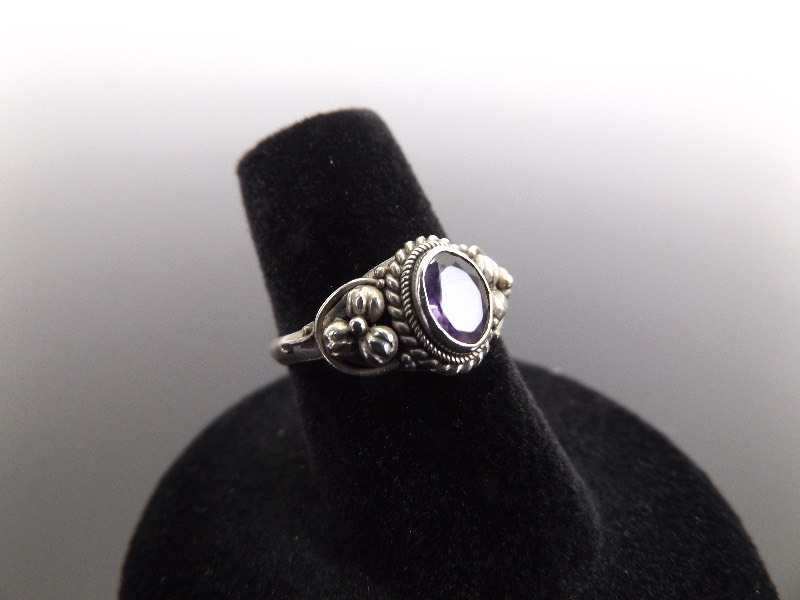 lot 23 image: .925 Sterling Silver Navajo Oval Cut Amethyst Ring Size 6.5