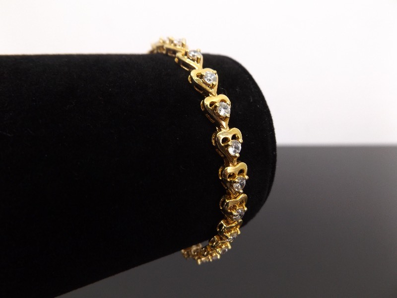lot 55 image: .925 Sterling Silver Crystal Heart Vermeil Tennis Bracelet