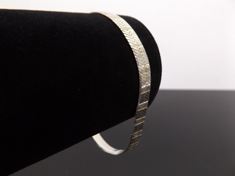 lot 57 image: .925 Sterling Silver Etched Herringbone Bracelet