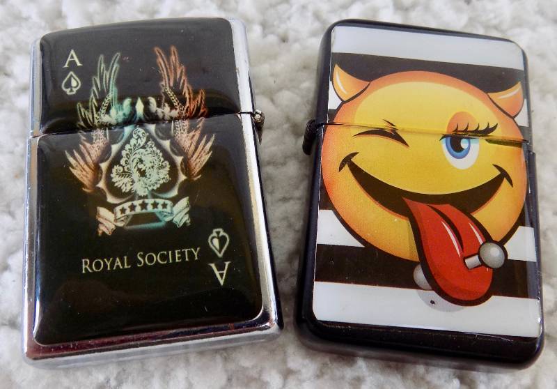 lot 22 image: Collection of 7 Lighter & Zippo Hand warmer