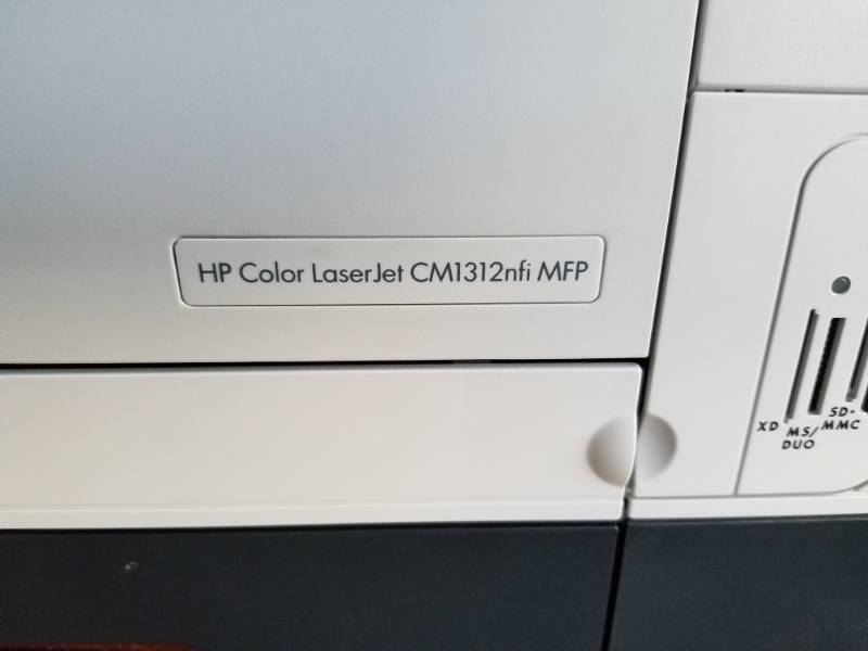 lot 32 image: HP Color LaserJet CM1312nfi Multifunction Printer