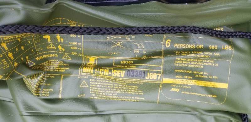 lot 3 image: Inflatable Fish Hunter Boat with Oars and Camo Cover