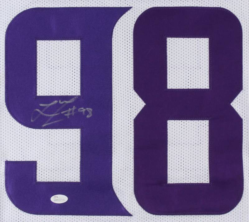 lot 11 image: Linval Joseph Signed Vikings White Jersey (JSA COA)