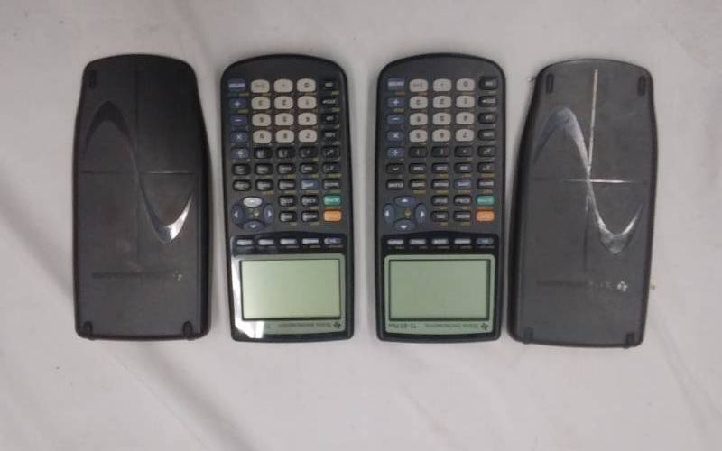 lot 28 image: 2-Graphing Calculators TI-83