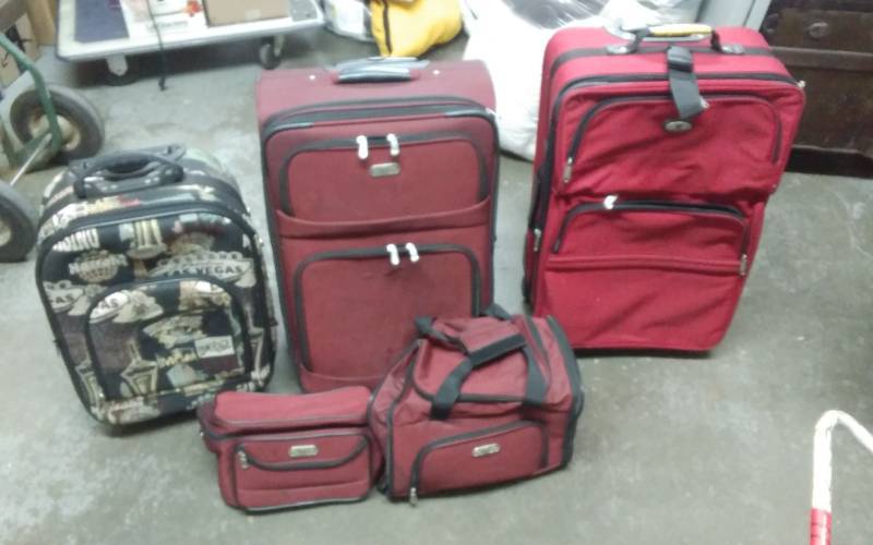 lot 32 image: 3 Piece Bob Mackie Luggage Set & 2-Other Rolling Suit Cases