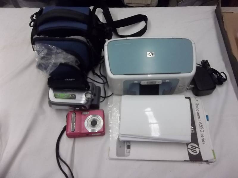 lot 26 image: JVC Handy-Cam Movie Camera, Polaroid I533 Digital Camera, Photo Printer & Related Misc.