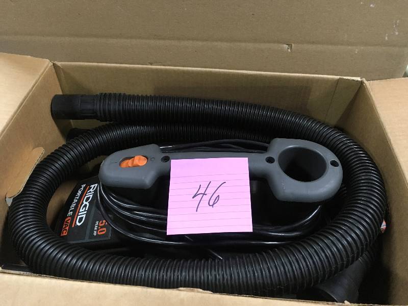 lot 46 image: RIDGID 4 Gal. 5.0-Peak HP Portable WetDry Vacuum  in good condition