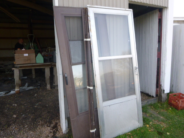 lot 142 image: 2 Storm Doors
