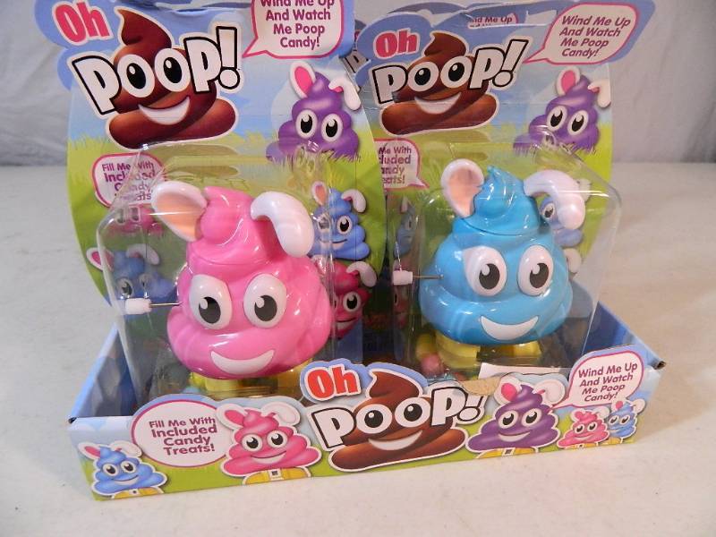 lot 54 image: 5 New Oh Poop Candy Dispensors with Candy