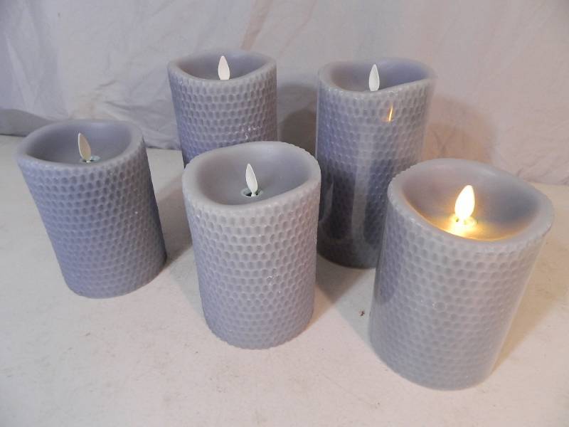 lot 123 image: 5 Luminara Flameless Candles with Remote