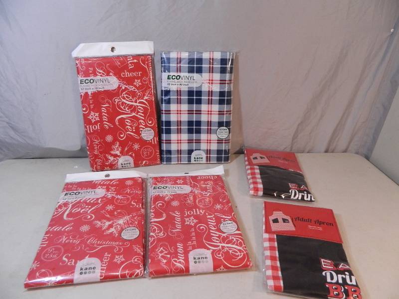 lot 153 image: 4 New Tablecloths and 2 New Aprons