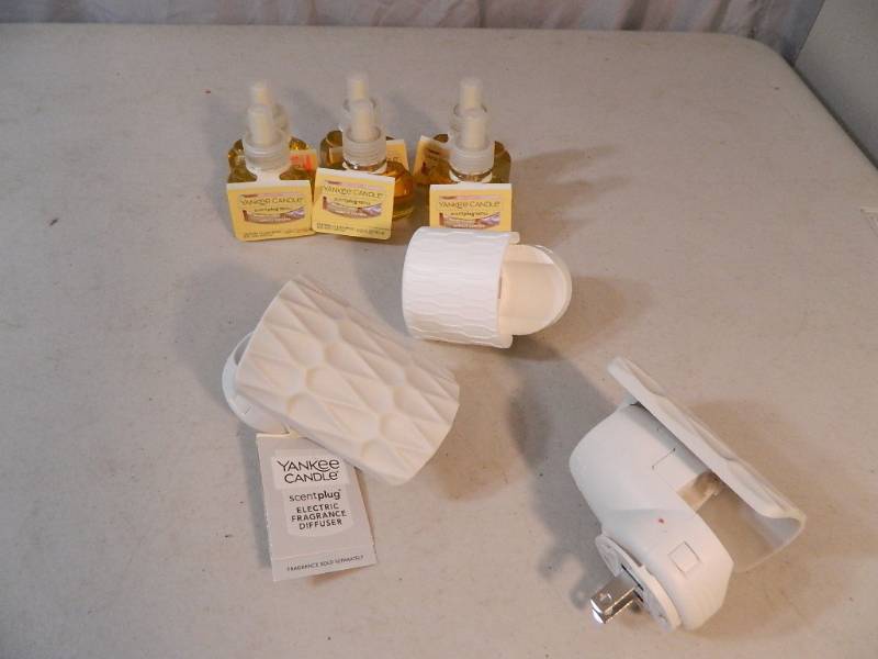 lot 182 image: New Yankee Scent Plugs and Refills