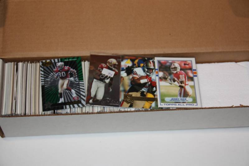 lot 31 image: Single Row Box Lot Jerry Rice
