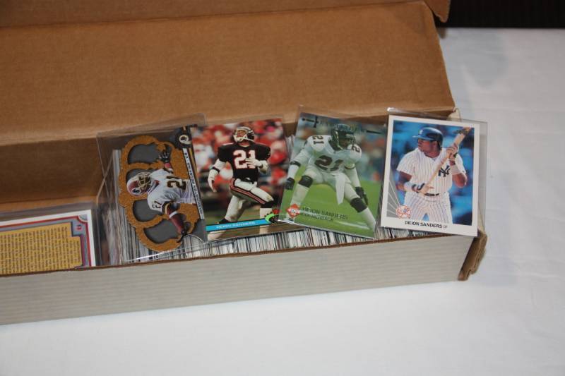 lot 37 image: Single Row Box Lot Deion Sanders