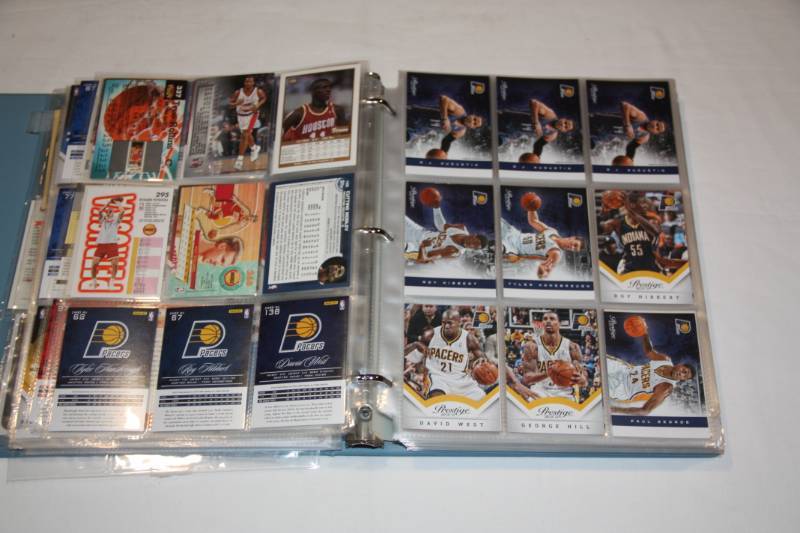 lot 93 image: Binder of Basketball Cards with 60 9 Pocket Pages